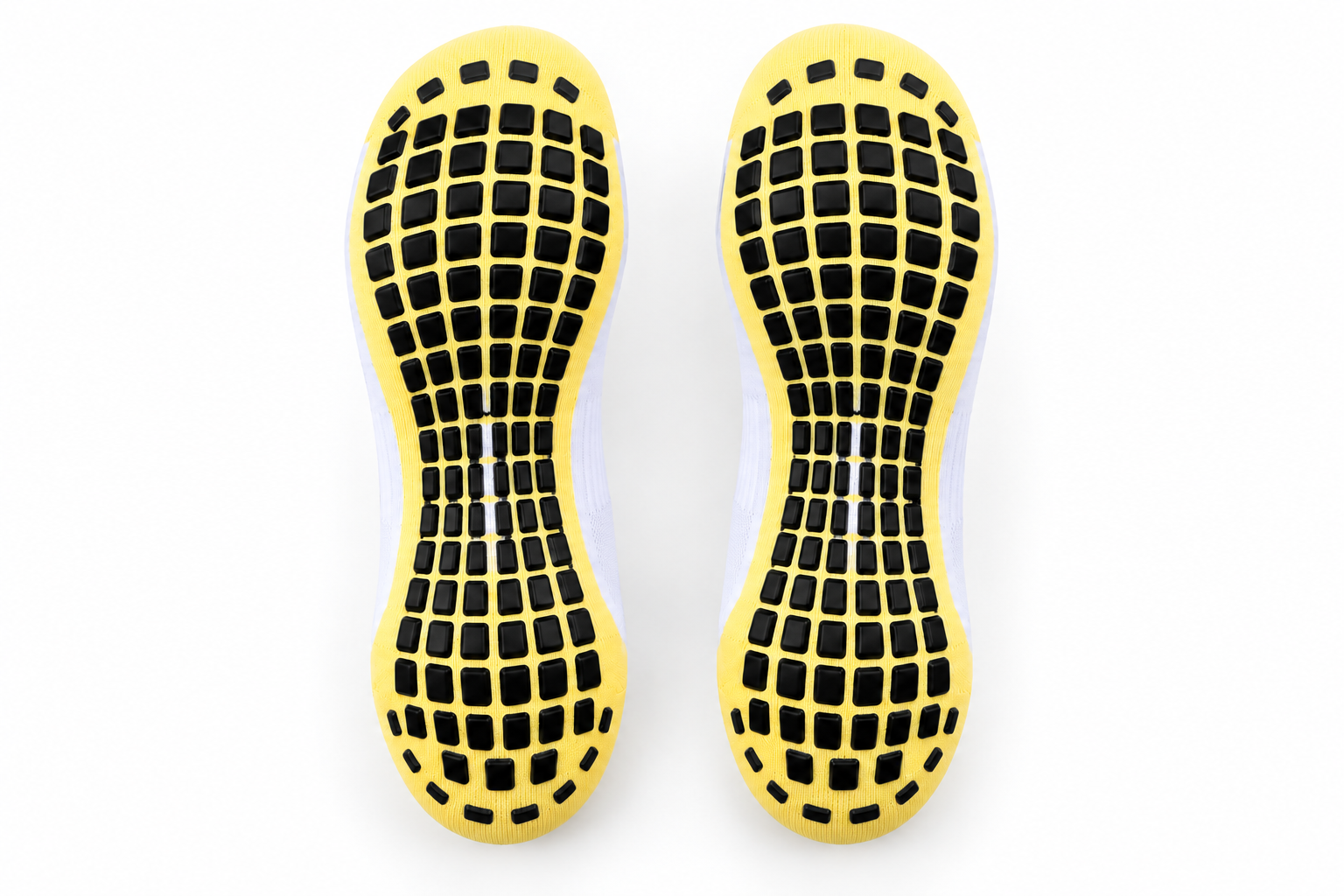 Dense first-sample sole grip layout on a pair of football socks