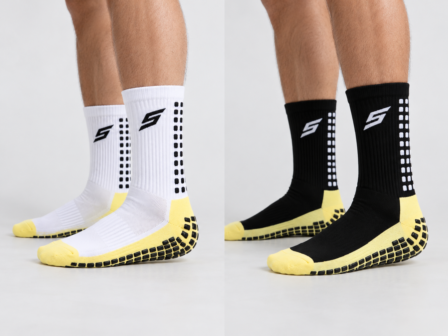 White and black first-sample football socks worn to evaluate logo placement