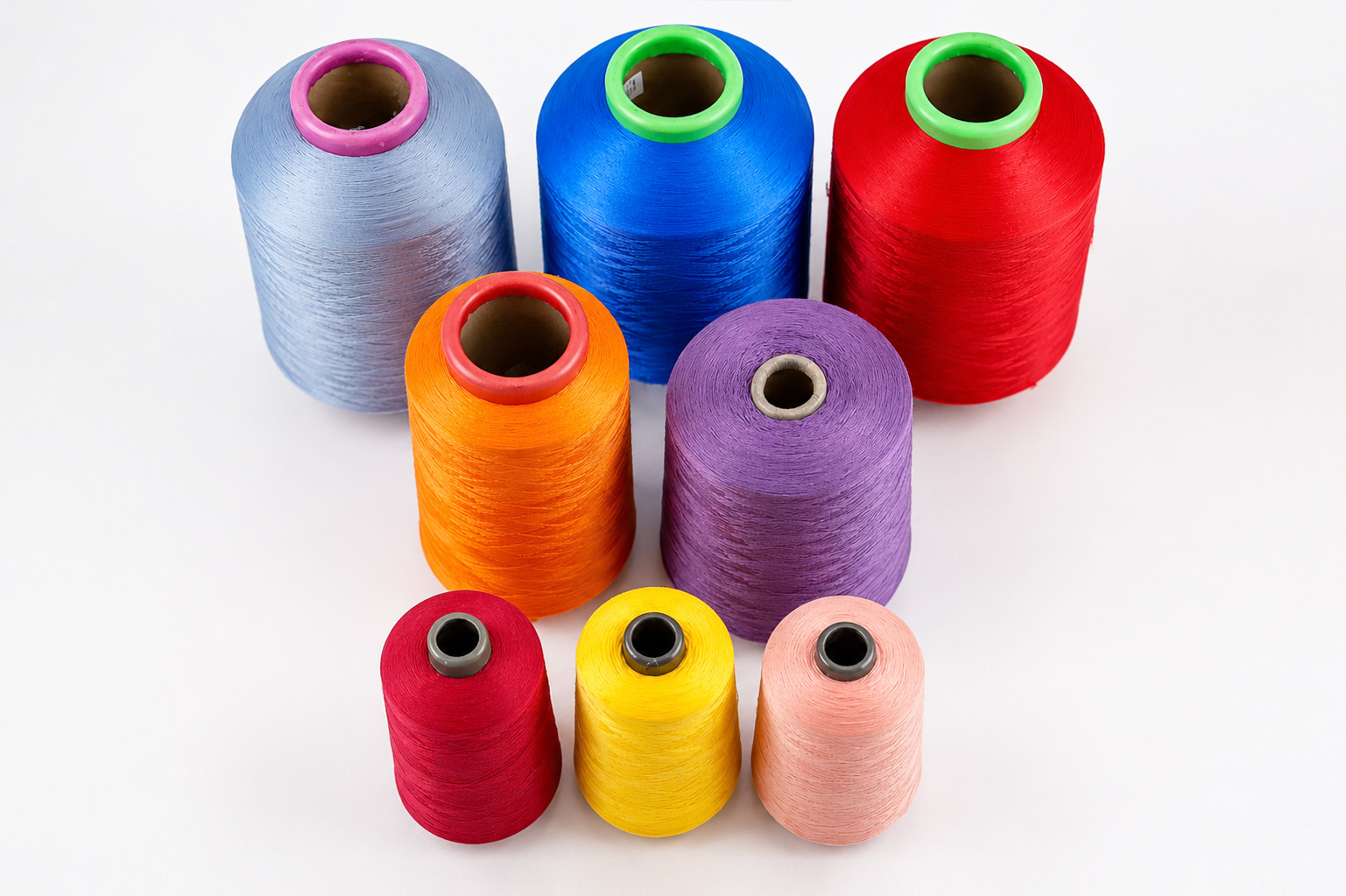 Assorted cones of colored yarn used as a general color-selection reference