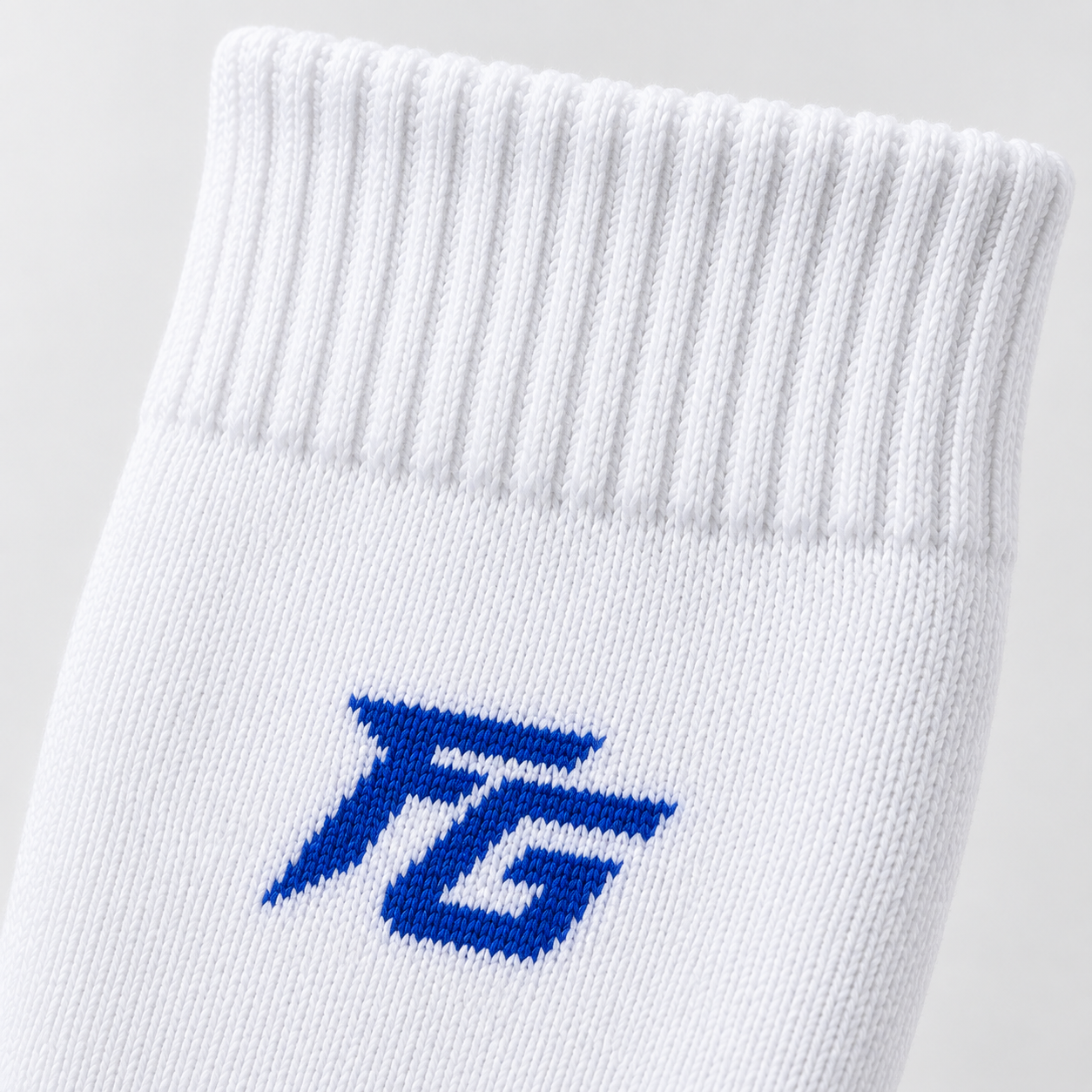 Close-up of sock material structure and supportive knit zones