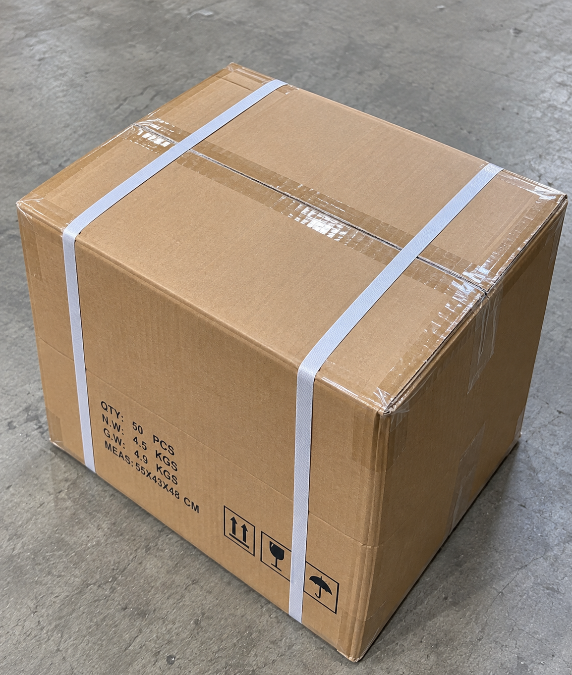 Closed wholesale shipping carton secured with straps