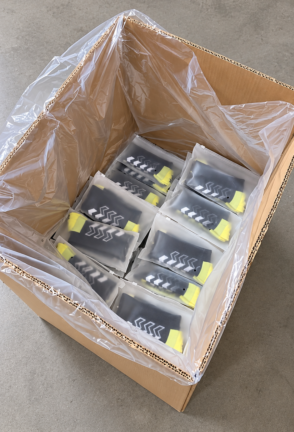 Wholesale socks arranged inside a lined shipping carton